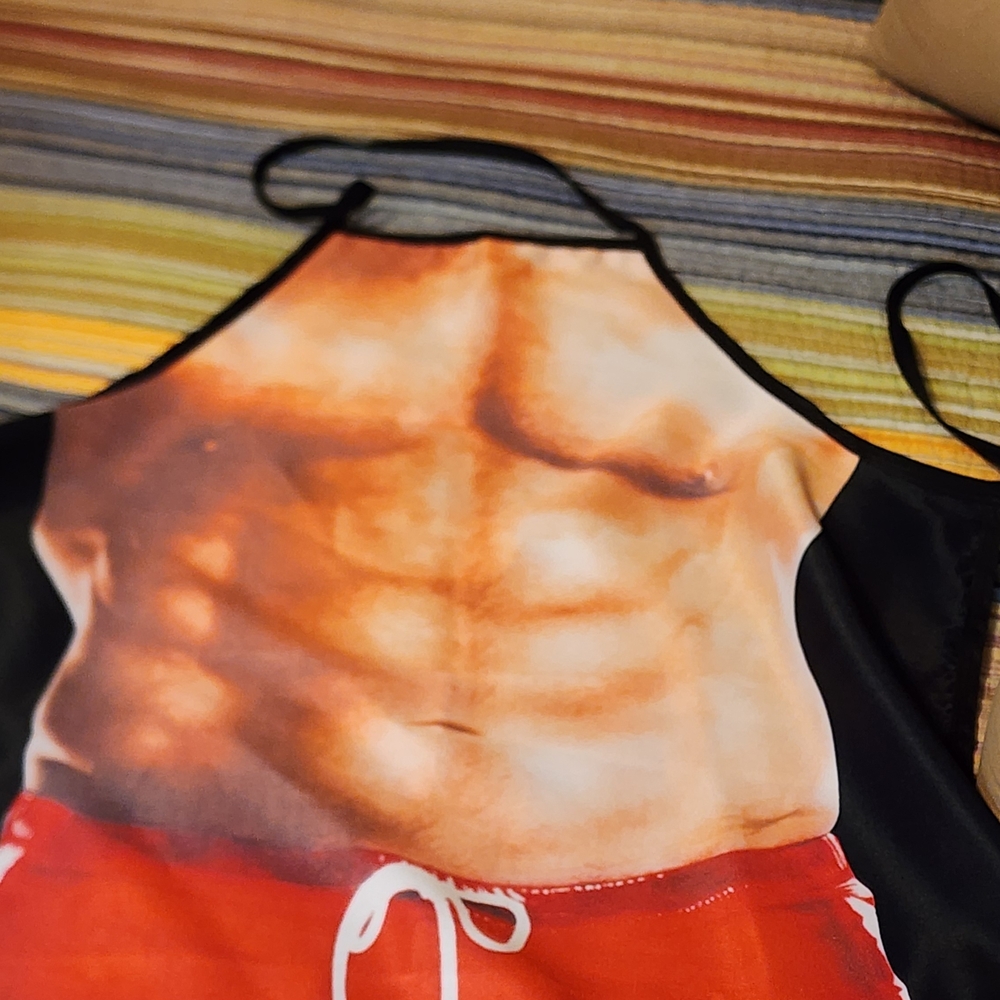 Muscle Print Apron with Red Shorts Design